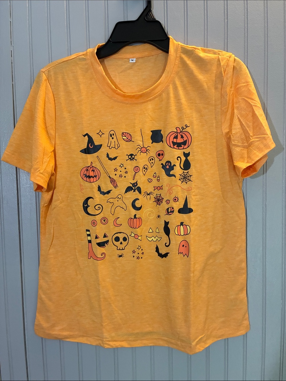 Halloween Icons T-Shirt - Orange. New in package. Women’s medium.